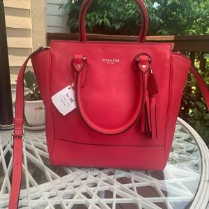 Brand new Coach leather handbag with straps